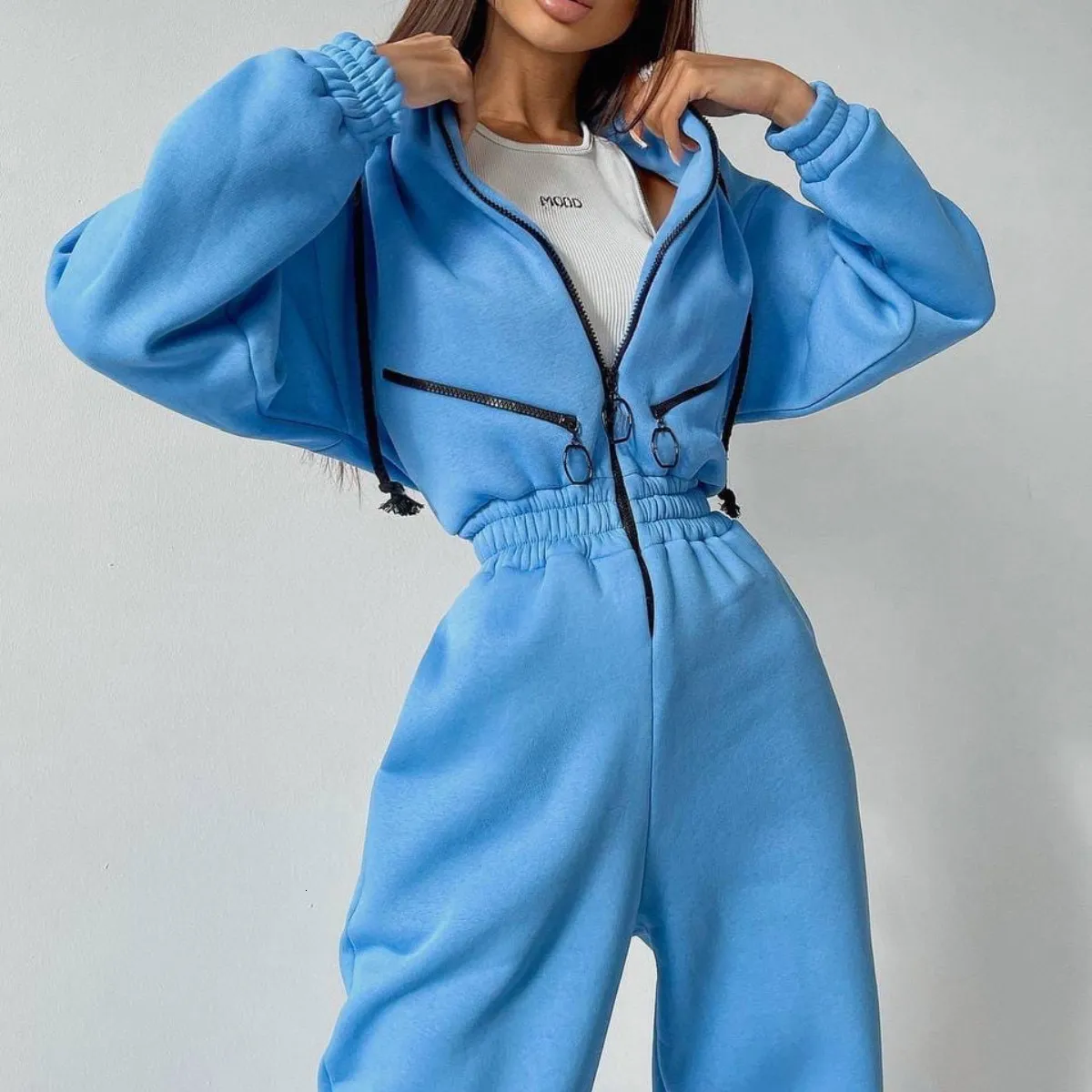 Kobiety Jumpsuits Rompers Women Eleganckie kombinezony z kapturem z bluzy zamek błony śluzowej sułko w kolanach zimowych długich rękawów