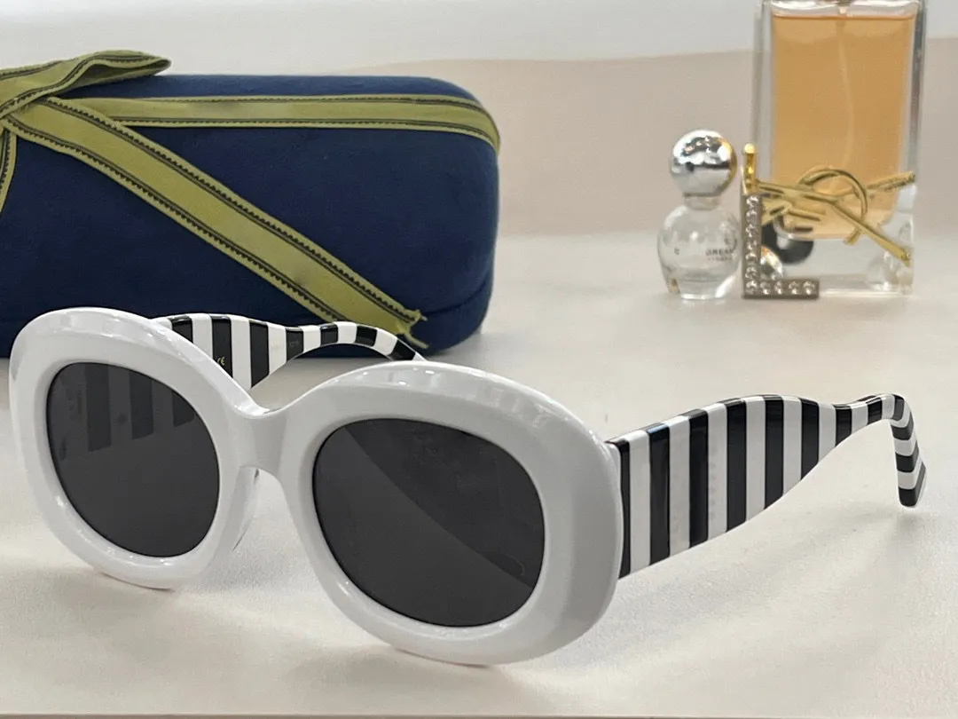 M￤n solglas￶gon f￶r kvinnor Senaste s￤ljer Fashion Sun Glasses Herr Solglas￶gon Gafas de Sol Glass UV400 -objektiv med slumpm￤ssig matchande l￥da 0985