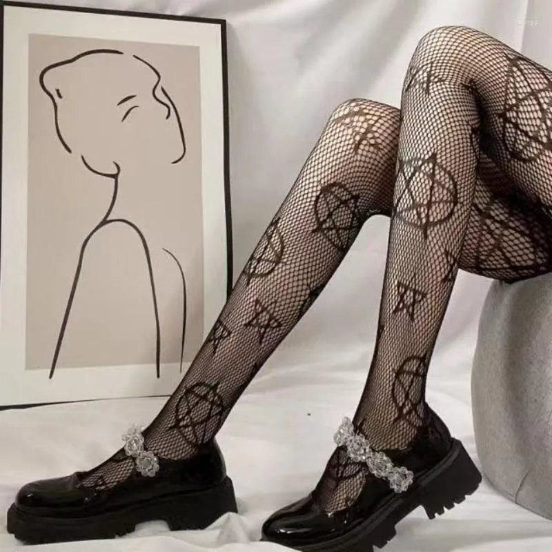 Kvinnors strumpor Kvinnors underkläder erotiska fisknät nät sexiga strumpor lår höga tights ihåliga tryck planet punk stretch strumpbyxor