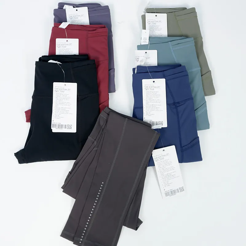 Vêtements de yoga Lu Aligner les leggings multi-poches taille haute Scruff double face Course à pied avec pantalon à neuf points à point inversé