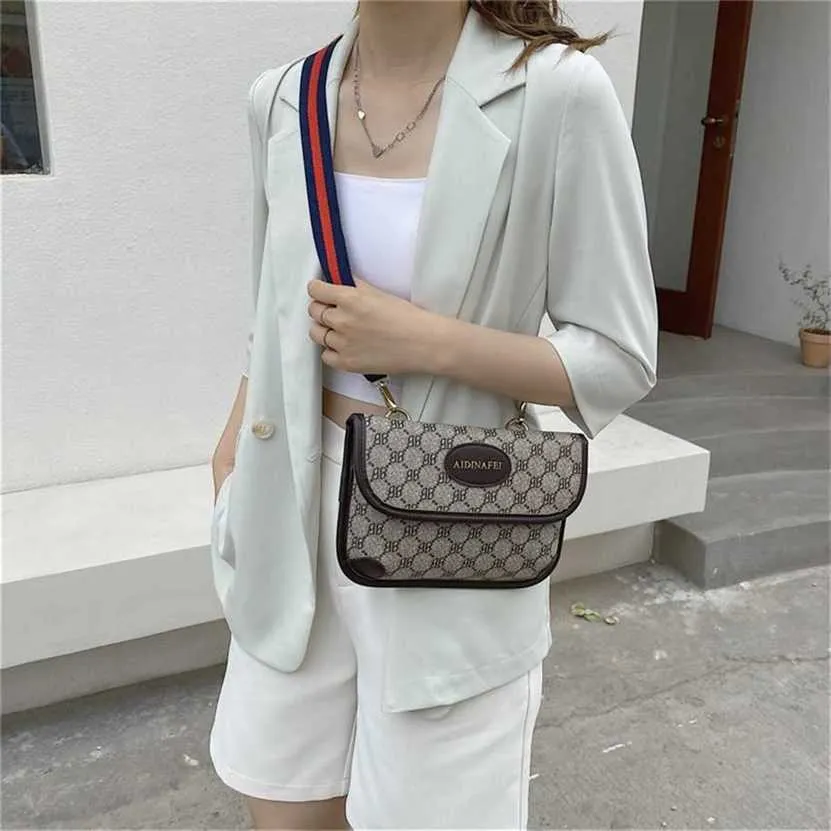 2023 Purses Clearance Outlet Online Sale Off Bag women's bag new fashion wide shoulder strap small square holding envelope Single Shoulder Messenger