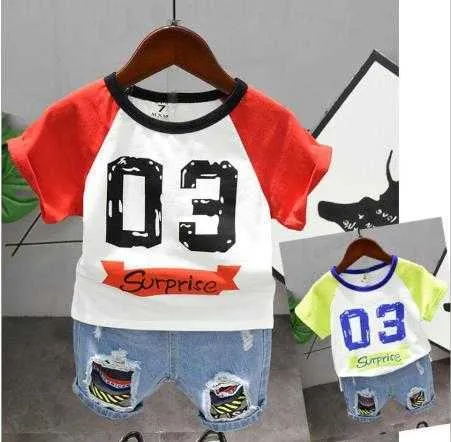 Completi Completo per bambini Ragazzo a maniche corte Abbigliamento Cuciture Lettera di moda Stampa Jeans strappati a maniche corte Twopiece Kids of Ye