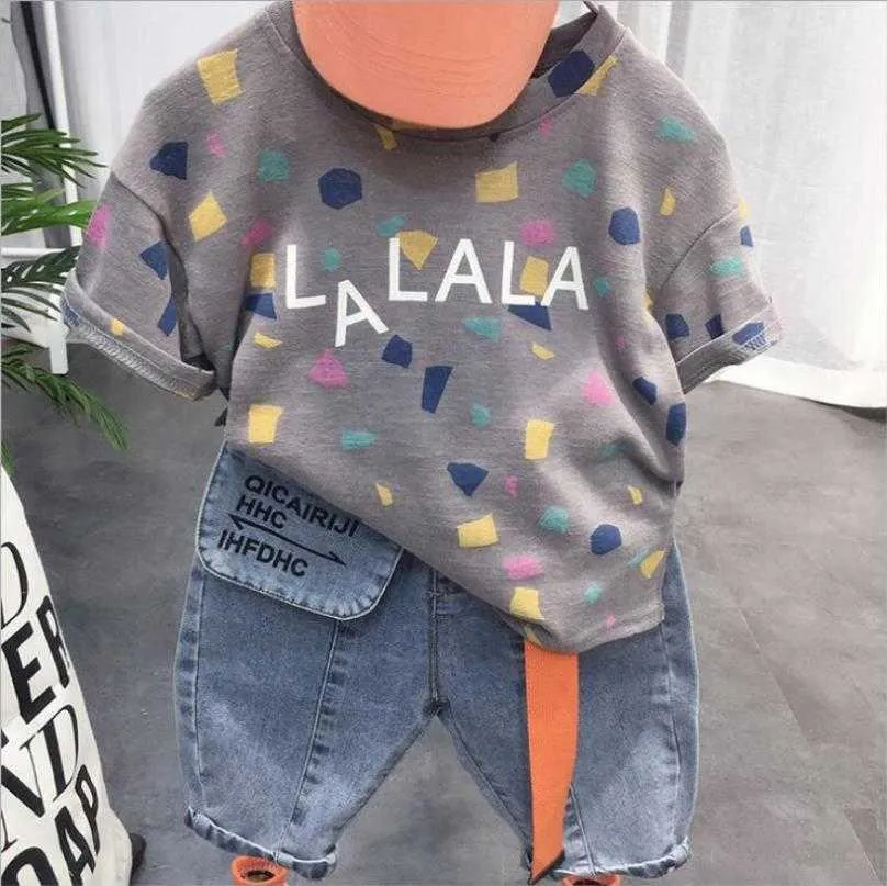 Set Abbigliamento estivo per bambini Nuove ragazze Ragazzi lettera Stampa Moda Bambino Maglietta a maniche corte Pantalone Abbigliamento per bambini Set sportivo