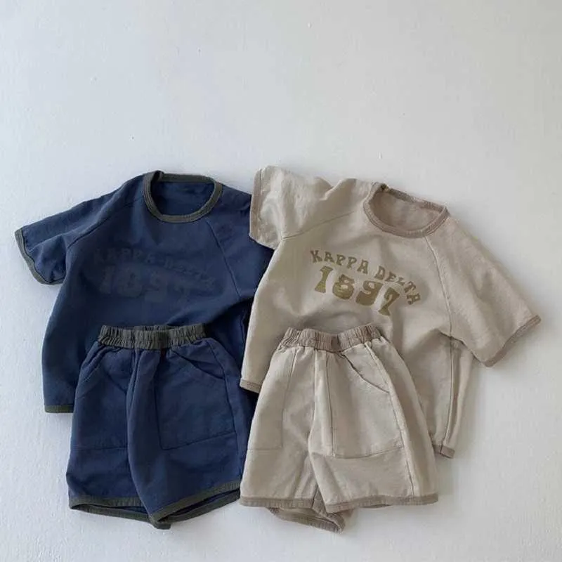 Roupas conjuntos de roupas de verão Ano do traje esportivo infantil New Color Contrast Printing Baby Shorts de manga curta confortável Twopiec