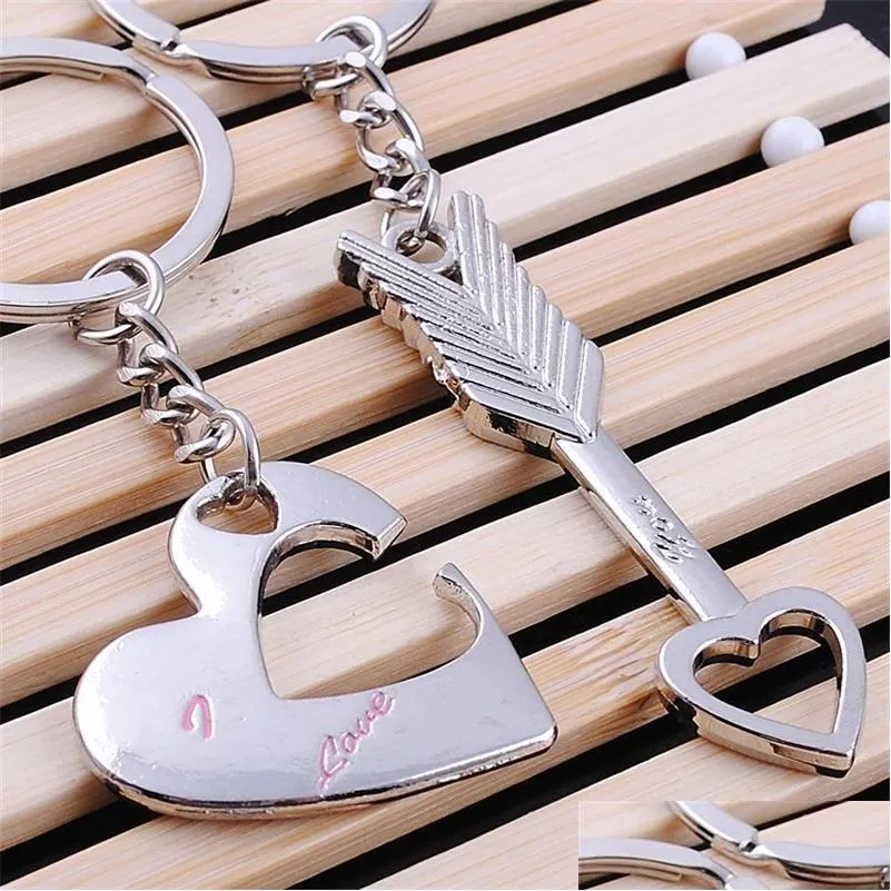 Porte-clés Amoureux de la mode Porte-clés Flèche Je t'aime Chaîne de coeur Porte-clés Cupidon Pendentif Bague Chaînes mobiles Cadeaux 609 K2 Drop Delivery Je Dh41Z