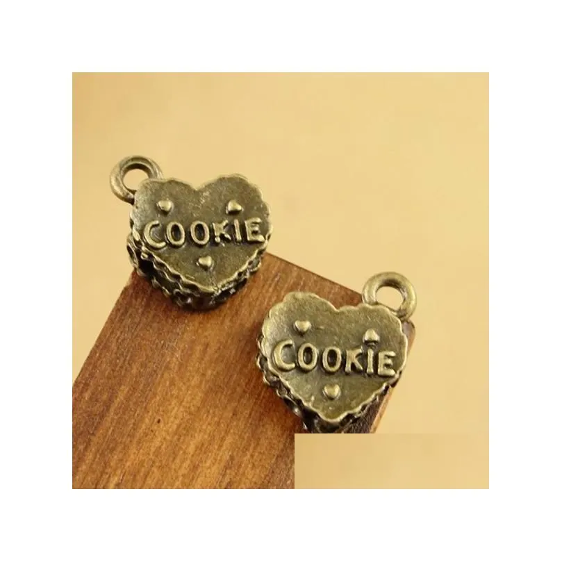 Charms 200 PCS Hartvormige hangerse antieke bronzen kleur met cookie goed voor doe -het -zelf ambachtelijke sieraden maken drop levering 202 dhdes