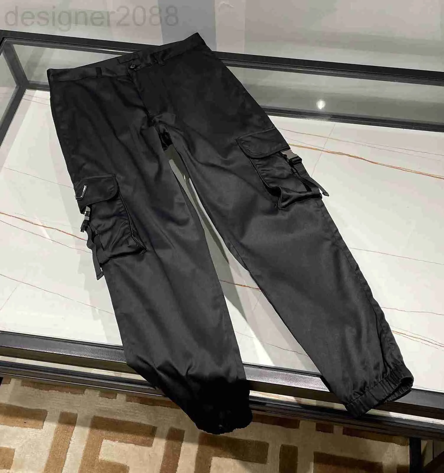 Pantalons pour hommes Joggers d'automne et d'hiver pantalons cargo de haute qualité concepteur de matériaux confortables élégant design d'épissage multi-poches luxe hommes noir 9LFP