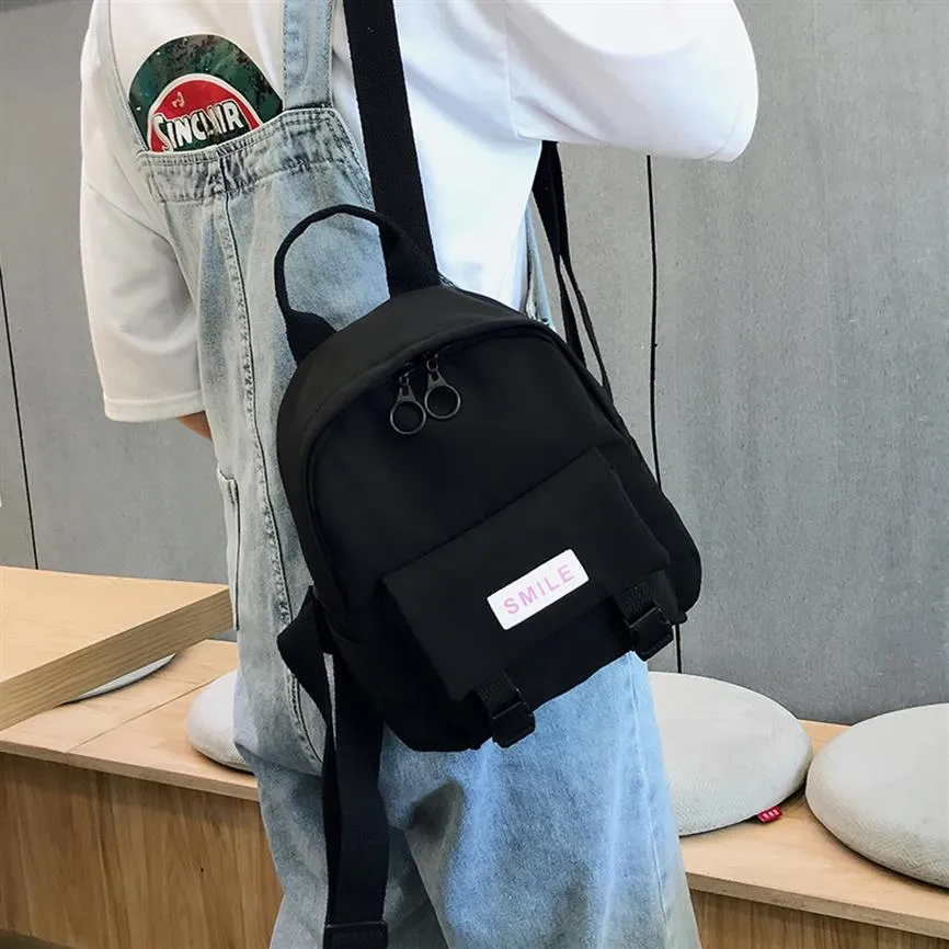 حقيبة الظهر في Oxford 2020 New Trend Women Backpack Backpack Fashion Counter Bag صغيرة القماش في سن المراهقة الفتاة.