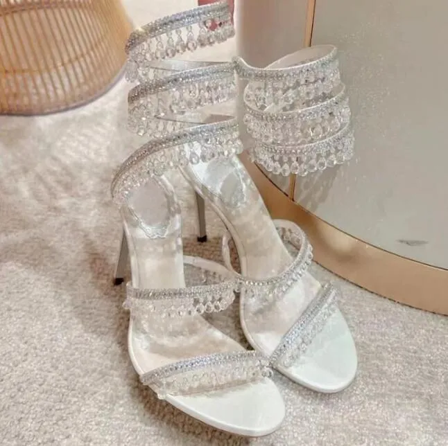 Crystal Chandelier högklackade sandaler Kvinnor Fairy Style Luxury Diamond Serpentine Wrapped Roman High Heels 10cm Sexig modedesigner Bankettklänningskor 01