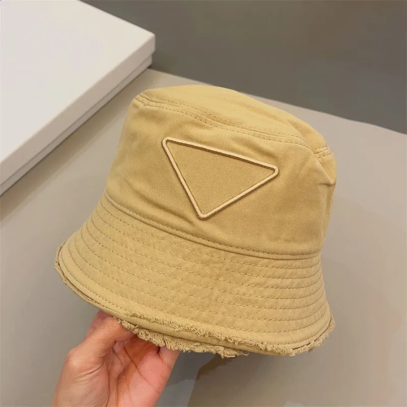 Luxe ontwerpers emmer hoed mode solide kleur hoeden ruw geelvedge klassieke letters cap resort zonbescherming casquette voor vrouwen en mannen