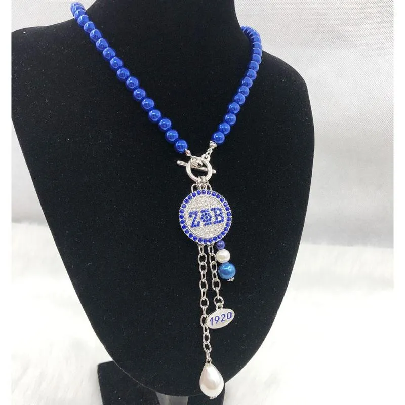 Collane con ciondolo Gioielli con collana di perle blu con strass fatti a mano della sorellanza greca ZPB 1920