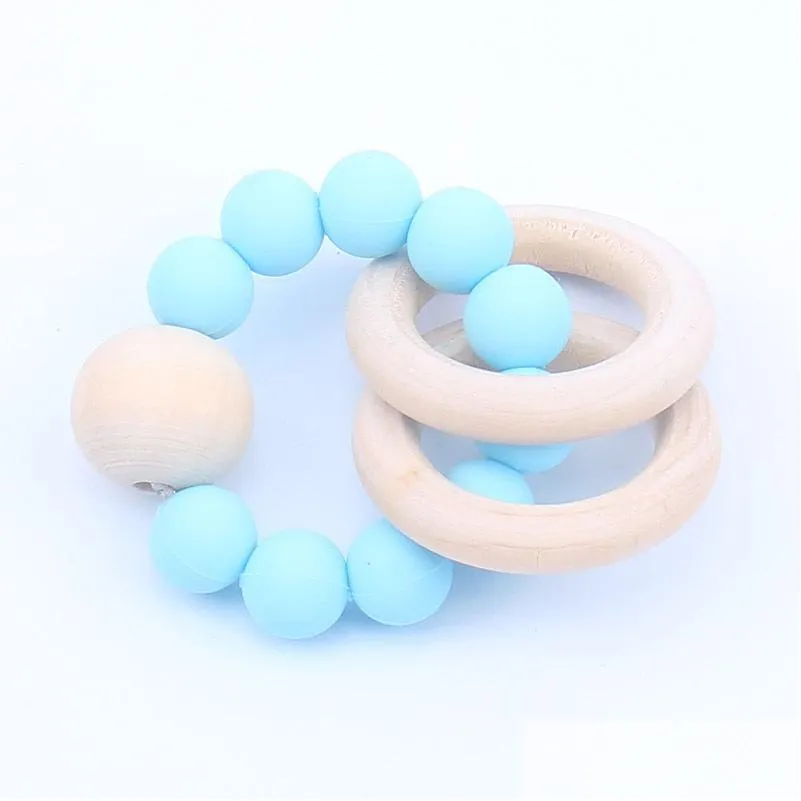 SOOTHERS TETESERS BABY TEELRINGS FOOD GRADE BEECH WOOD TEING RING RING RING TOYS SHOWER PLAY ROUND WOODS WOODS BEAD新生児SILE 826 DHMXE