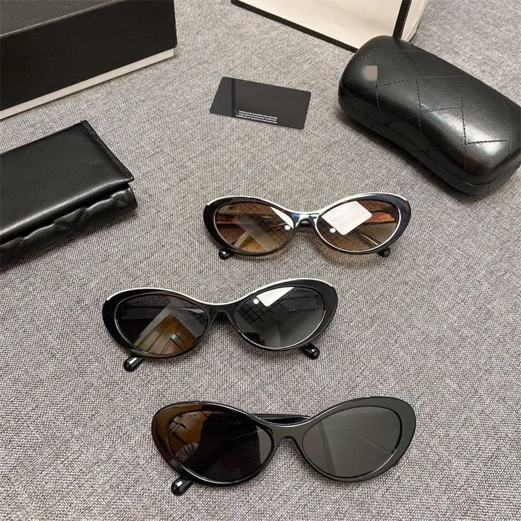 DHgate.com:Womens Designer Oval Sunglasses: Vintage Letter