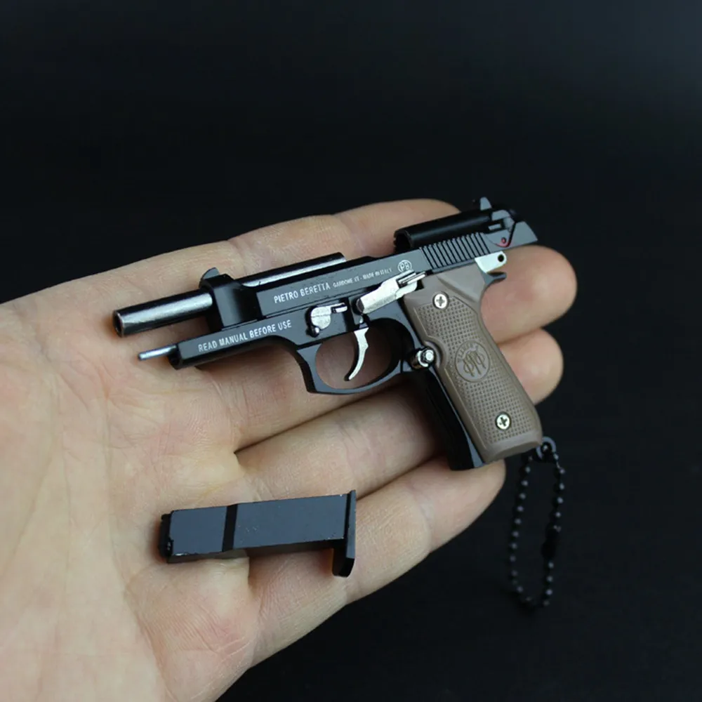 Beretta 92F Metal Pistol Gun Model Model Toys 1: 3 قابلة للإزالة يدوية تخفيف الإجهاد تململ لعبة مفتاح السلسلة الرئيسية مع حافظة صافية 1642
