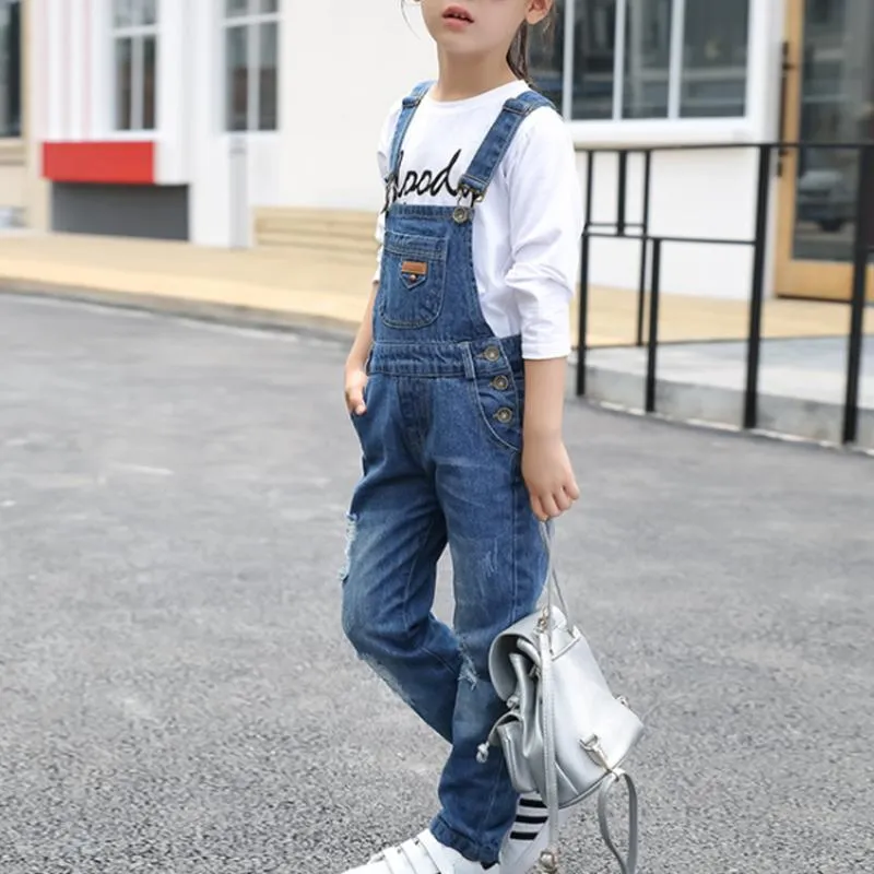 Jumpsuits Kids Denim Overalls 2023 Spring Big Girls Cowboy Strap Hole Suspender Pants Children Korean Belt Trousers Casual Jeans Clothes