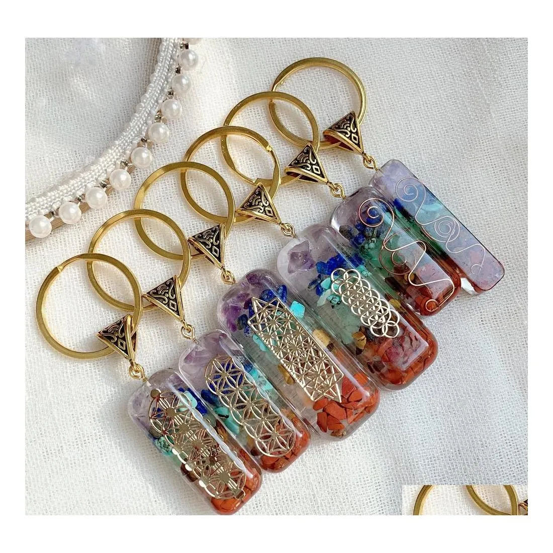 Kluczowe pierścienie 7 Chakras Orgone Pendum Energy Kryształ Kamień Klasyna Uzdrawianie Amet Keyrings dla medytacji samochodowej Reiki Om Lucky Gift Drop de Dh0v7