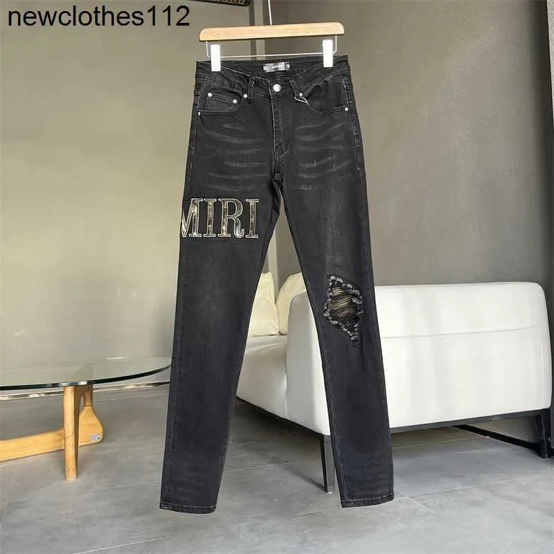 Men's Jeans Amirs Designer Fashion Pants Cool Stylish Leisure Ripped Brand Black Washed Hole Letter Embroidery Leather Slim Fit