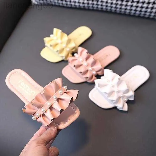 Slipper 2023 Летние новые детские тапочки модные жемчужины для девочек сандалии сандалии с бисером принцесса пляжная обувь повседневная детская детская квартира для малышей.