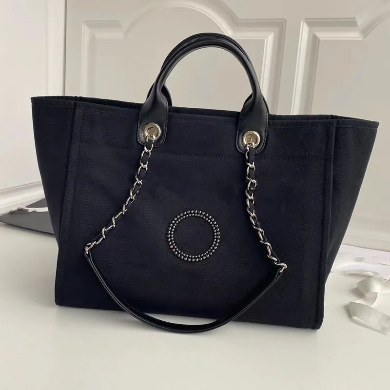 7A Yeni Top Womens Bag Tuval Alışveriş Çantası İnci Elde Taşıma Çantası Lüks Tasarımcı Boncuklar Klasik Moda Retro Marka Omuz Denim Büyük Kapasite Klasik CC