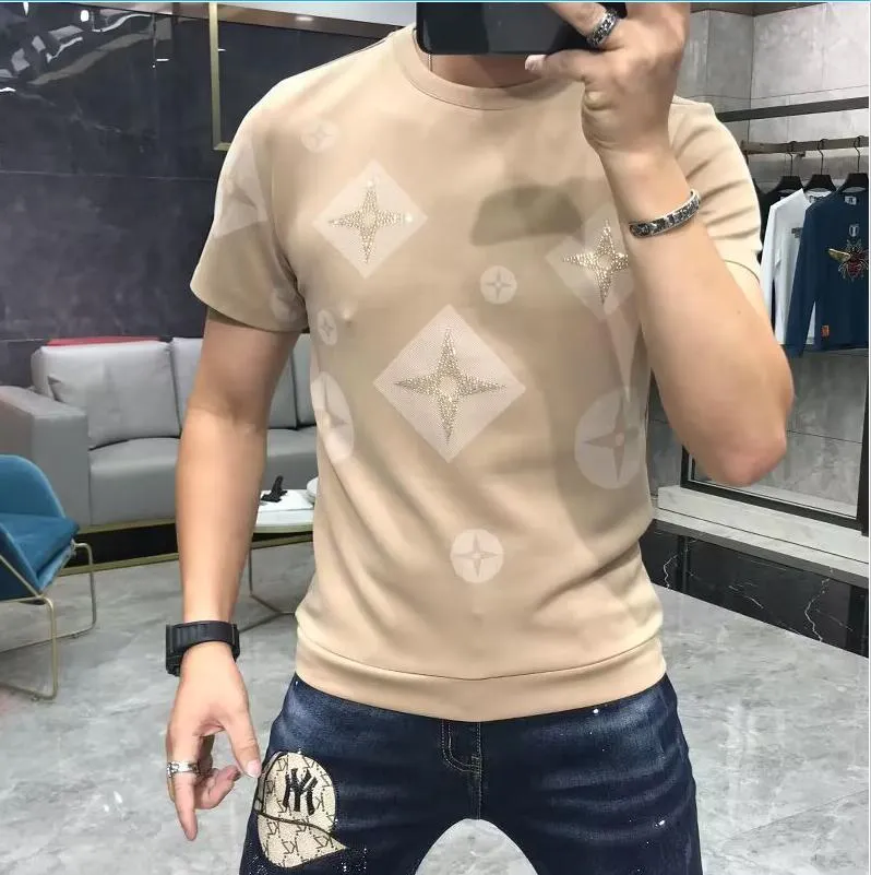 2023 camisetas masculinas de ver￣o Novo impress￣o de impress￣o mercerizada strass de algod￣o casual machos slim tees designer de colarinho redondo tamanhos de pluze mangas curtas roupas top