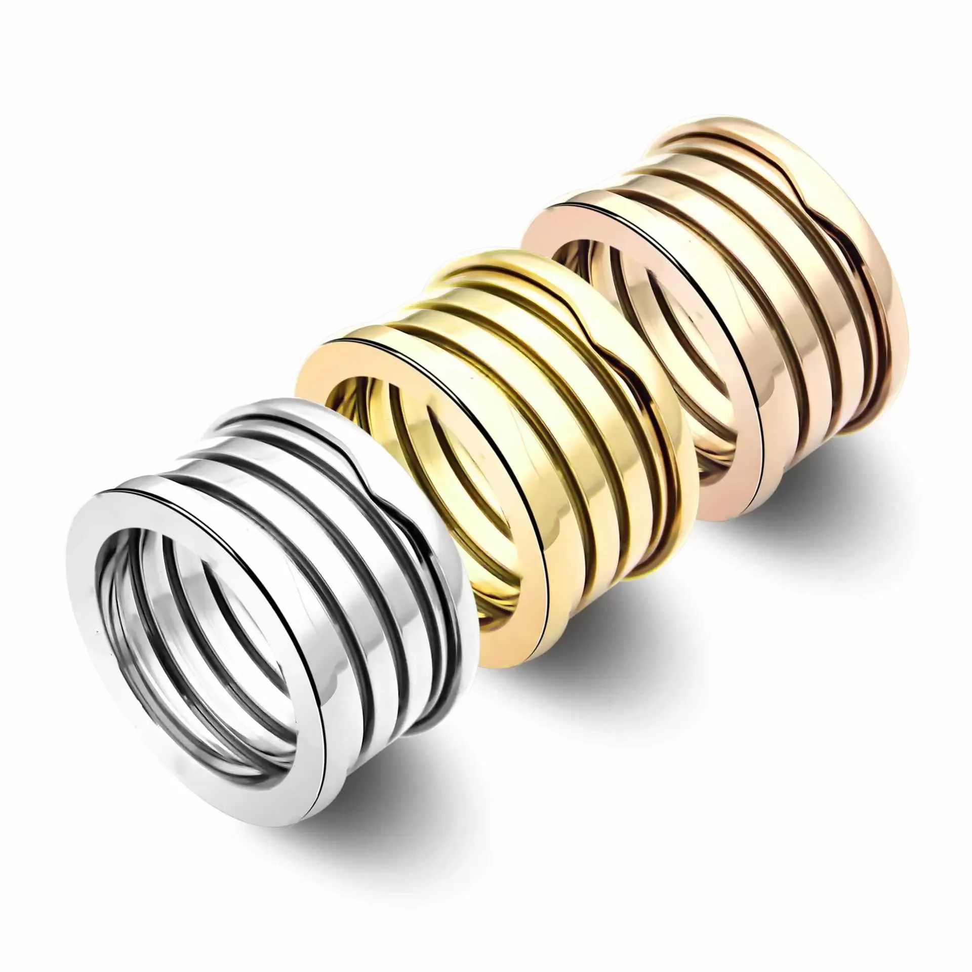 Design clássico 3 cores Ring de estilo de luxo Wide Five Rings Wide Spring Ring Spring Stoinless Women Jóias por atacado