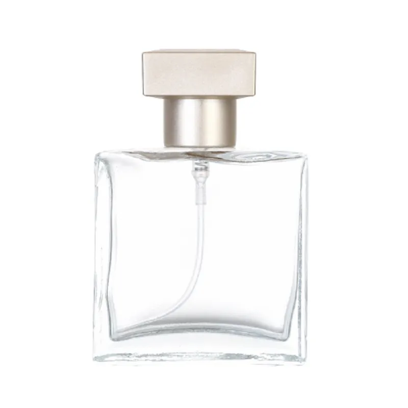 Embalaje de 25ml, botella de cristal transparente de Perfume vacía, bomba de prensa de oro Spary con tapa, contenedor de embalaje rellenable cosmético portátil