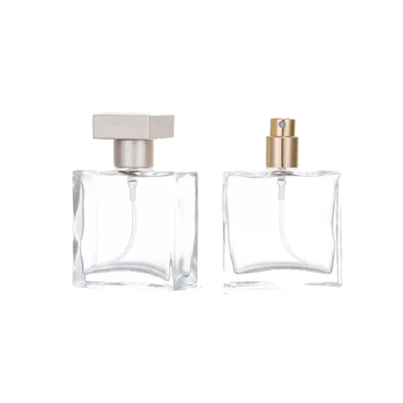 Embalaje de 25ml, botella de cristal transparente de Perfume vacía, bomba de prensa de oro Spary con tapa, contenedor de embalaje rellenable cosmético portátil