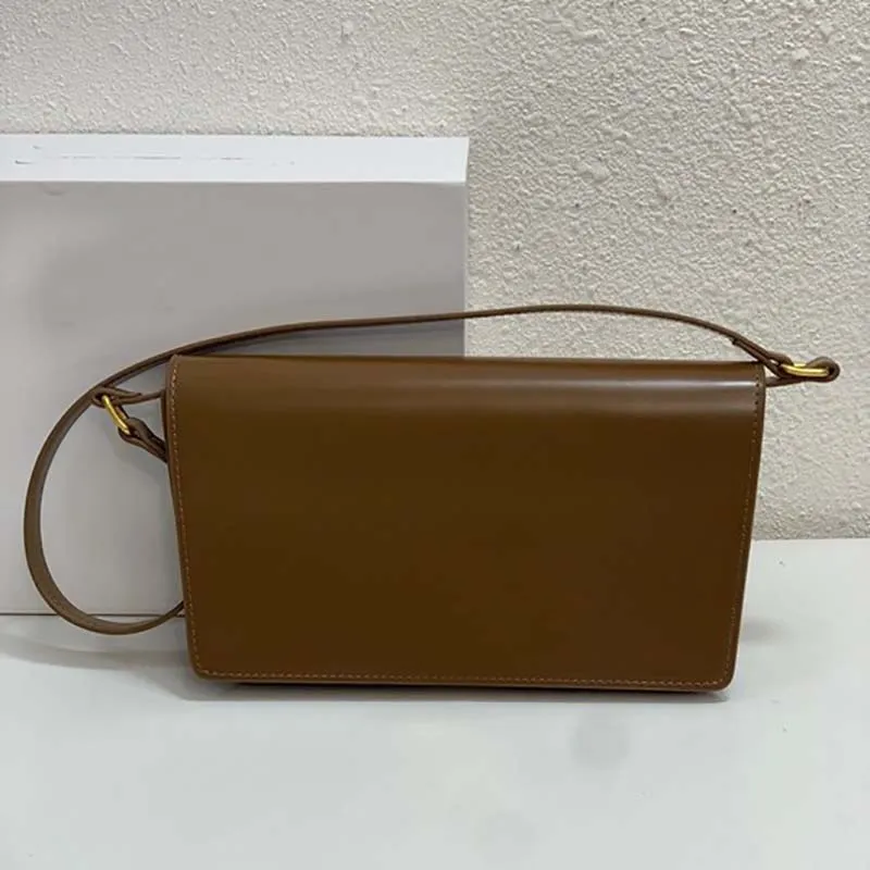 Najnowsza torba trapeza błyszczące torby z cielęcia na ramię snap guziki luksusowe projektantki portfel torebki 2023