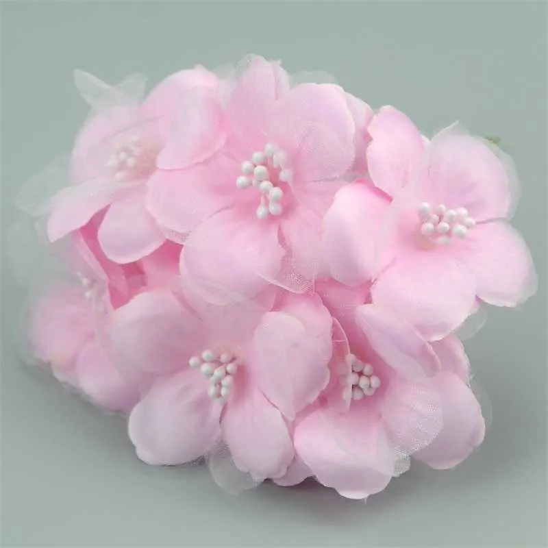 装飾的な花の花輪6pcs/lot 5cmシルクスクラップブッキングミニローズ人工corsage結婚式の装飾用花bouquet