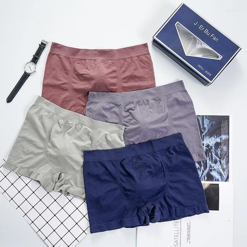 Caleçon 4 pièces boxeurs hommes sans couture et respirant Sexy solide élastique taille moyenne Nylon slips U poche convexe Boxer sous-vêtements