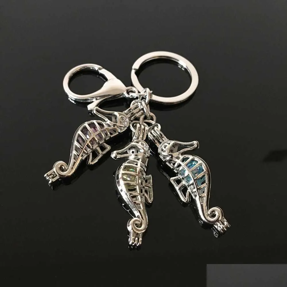 Keychains Lanyards Euramerican Seahorse Pearl Cage Key Ring Can Open Hollow Noctilucent Volcanic Stone Pendant Keyring Drop Delivery Dhieu