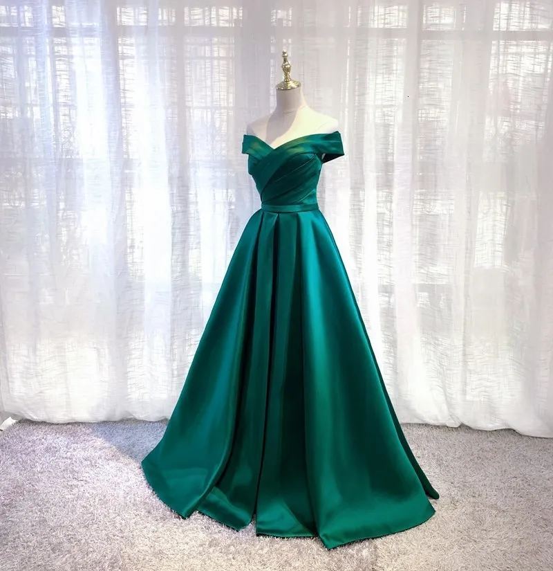 sachin and babi light blue dress Buy Emerald Green Textured Satin Halter Sleeveless Midi Dress from the Next  UK online shop