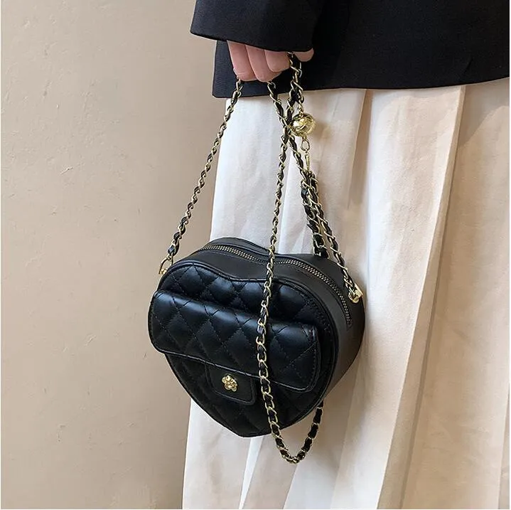 Bolsa feminina casual e f￡cil de usar no ver￣o da moda, novo estilo ocidental de bolsas de ombro quadradas de estilo de ombro de estilo Western