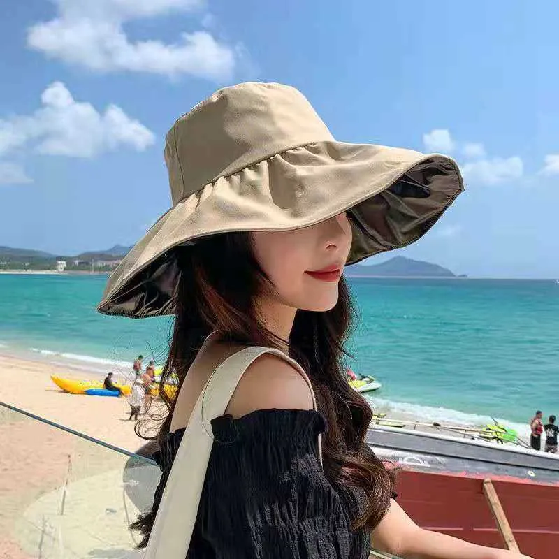 UV Protection Wide Brim Vinyl Bucket Hat Hm For Women Foldable Solid Color  Cap For Summer UPF50 AA230508 From Qiaomaidou07, $20.71