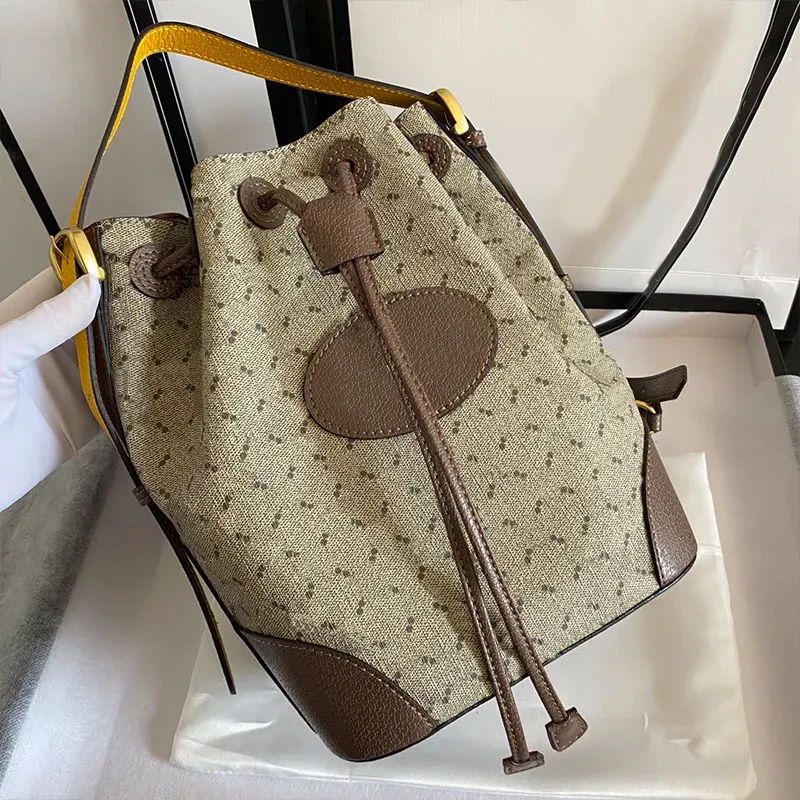 Designer drawstring bucket bag hotsell