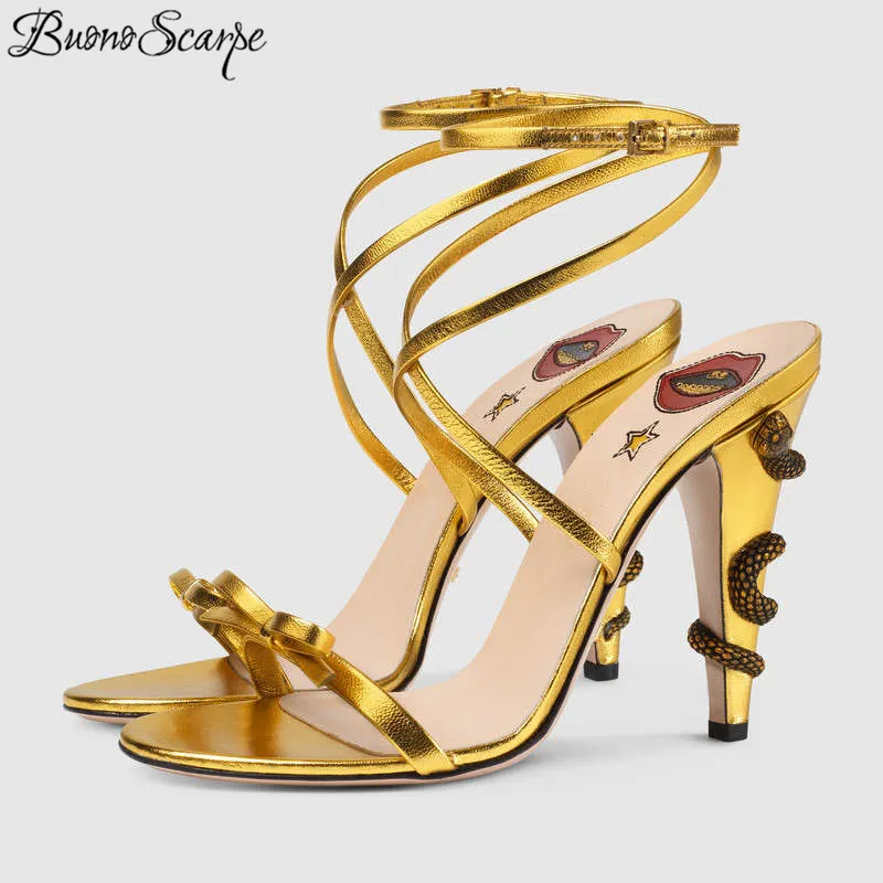 Сандалии золотая металлическая змея вокруг пятки сексуальные женщины Bowknot High Heels Summer Party Shoes raf Щелка Slingback Gladiator 230223
