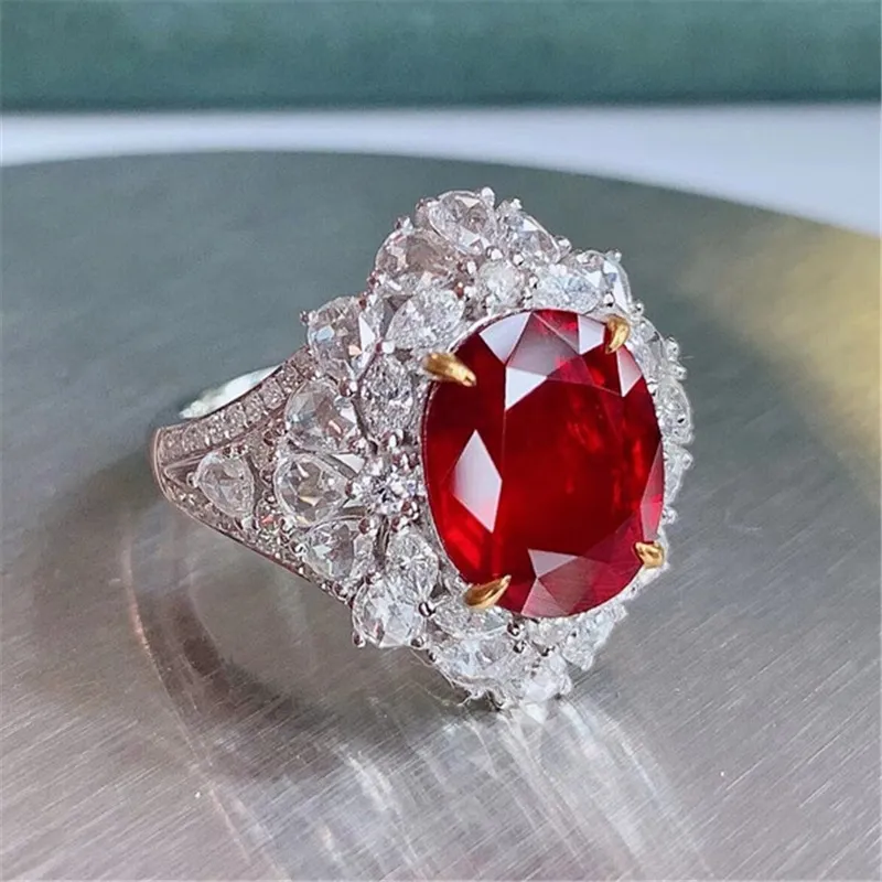 Vrouwen trouwringen Europese en Amerikaanse stijl imitatie ruby ​​geometrisch rood kristal zirkon diamant dame zoet wit goud vergulde ring feest sieraden verjaardag cadeau