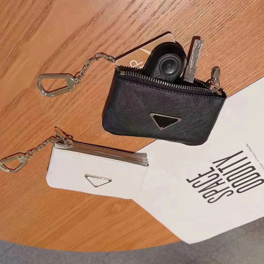 Kluczowa torba Projektant Projektant Klucz Okładka Trójkąt Trójkąt Logo Klucz Pierścień Klucz Wisior Mężczyźni i uniwersalny klucz neutralny model ochronny