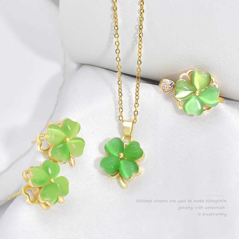 Rotatable green four leaf necklace women's luxury simple and versatile cat's eye love set