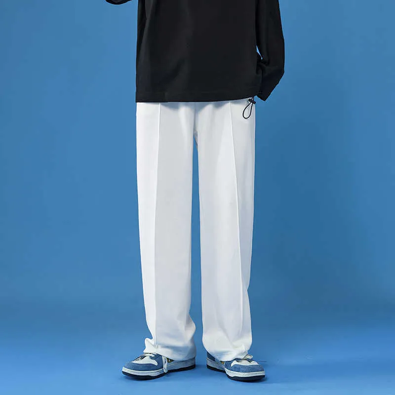 Calça masculina calças casuais retas calças de moletom de sorra preta coreana calça de harém solto mulher streetwear de outono longa calça quatro temporadas z0225