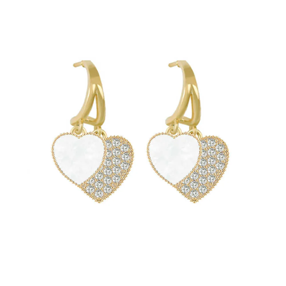 Charm koreansk modeversion av de nya kärlekshjärtaörhängen för kvinnor klassiska zirkon hjärtformade genomträngda öronspänne exklusiva smycken G230225