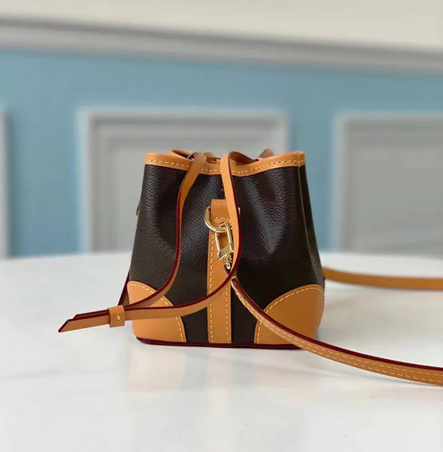 Tasarımcı mini kova çantası lüks omuz çantası çanta orijinal deri çapraz çantalar 12cm üst düzey çoğaltma kutusu wl118