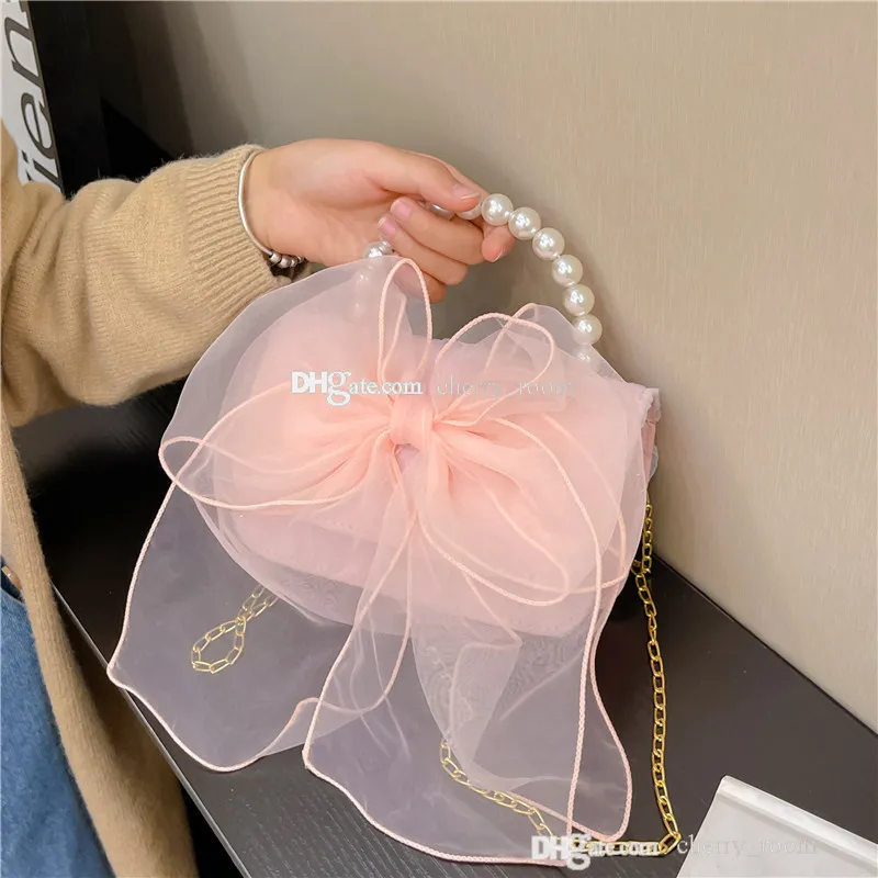 2023 Girls Butterfly Princess Handväskor Spring Summer Big Bow Lace Kids Pearl Portable Cross Body Bag Fashion Children One Shoulder Bags F1567