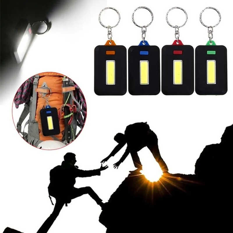 Porte-clés Mini Portable COB LED trousseau torche d'urgence Camping pêche randonnée Flash lumière Mode lampe outils de plein air aléatoire 1pcsKeychains KeK