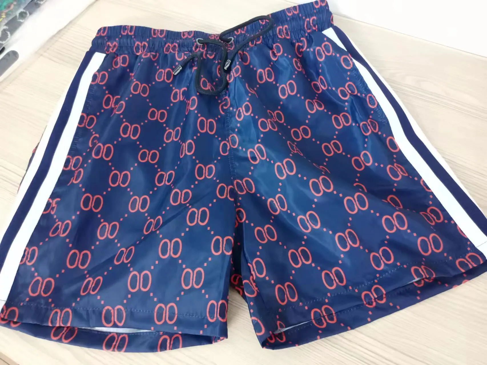 2023 Summer Fashion Shorts New Designer Board Short Snabbtorkning Badkläder Printing Board Beach Pants Men Mens Swim Shortsqaq