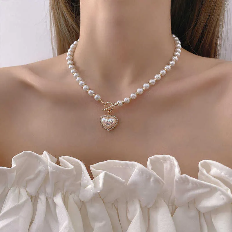 Collier d'amour de perles de luxe léger pour femmes été nouvelle mode conception de niche sens chaîne de clavicule cou polyvalent
