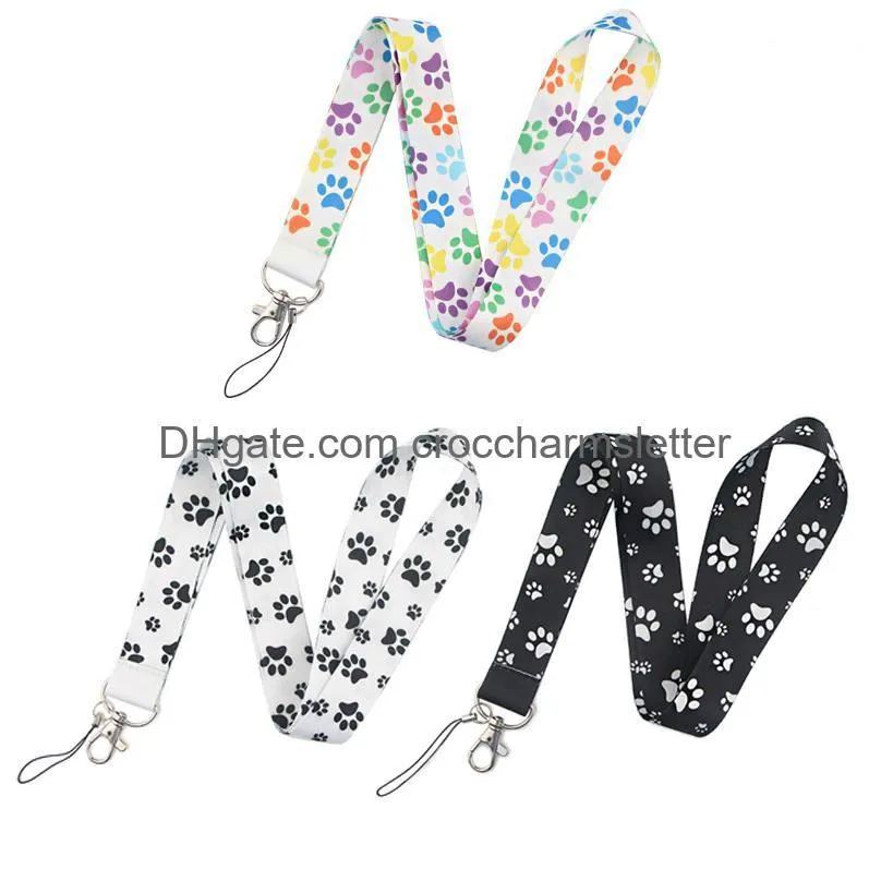 Mobiele telefoonbanden charms schoenonderdelen accessoires lb2234 cartoon honden poot print sleutelhanger lanyard voor sleutelcamera fluitje id badge hold otybs