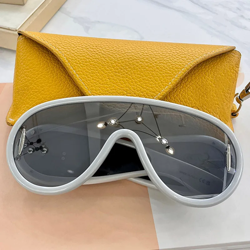 2024 güneş gözlüğü tasarımcısı lüks dalga maskesi lw40108i gümüş lens oval büyük çerçeve gözlük