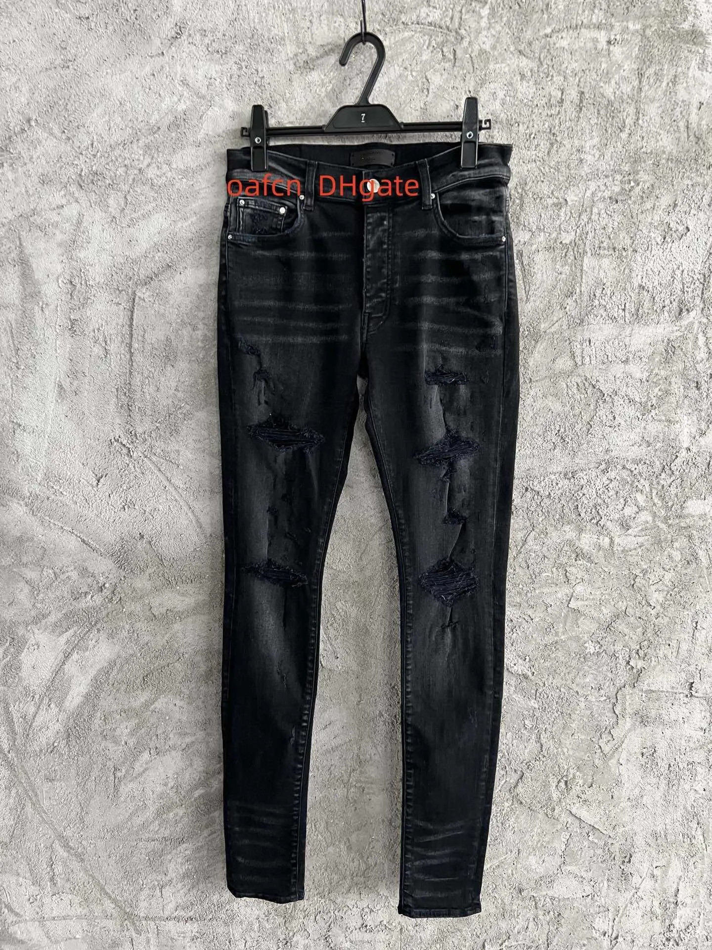 Designer 23SS avec des trous en vrac ajustement amincissant jeans à encre éclaboussée pantalon de jean décontracté de jean hip-hop