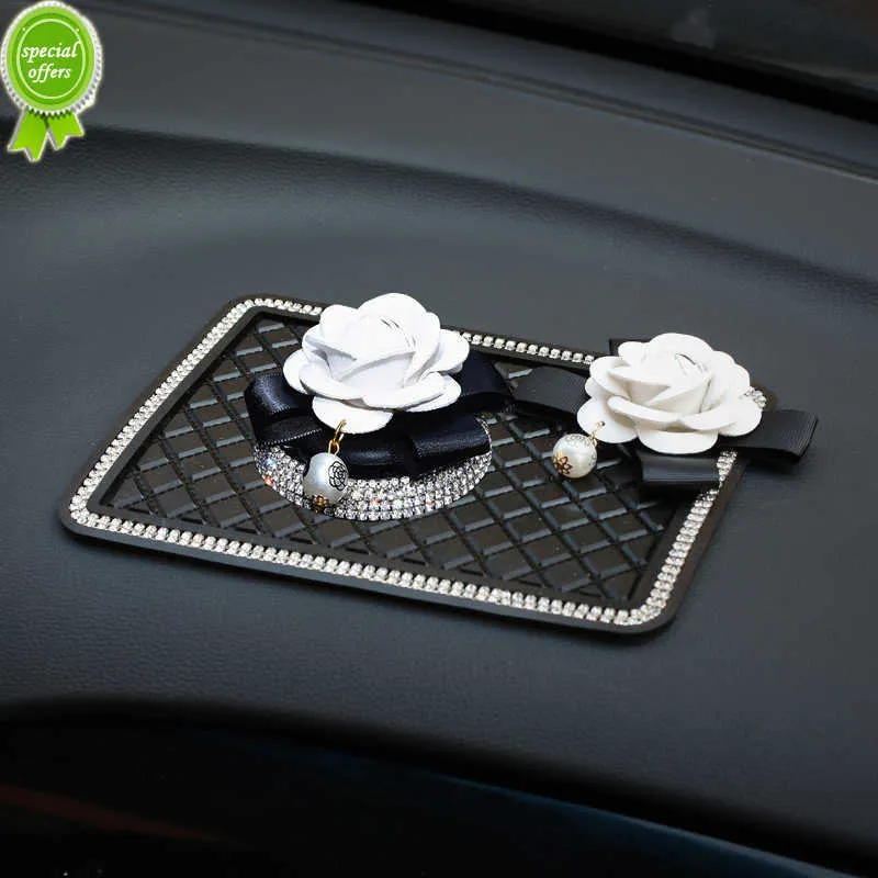 Novo criativo flor de camélia enfeites de carro diamante cristal purificador de ar auto painel decoração interior carro perfume adesivo